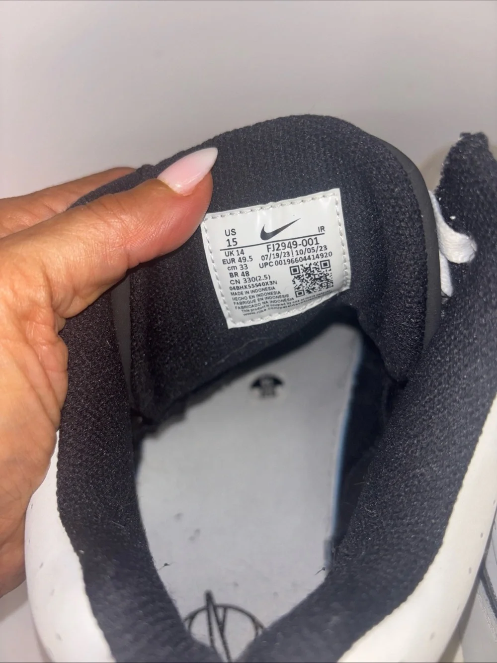 Size 15 Nike Men’s Gray and Black High-Top Sneakers